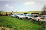 Old Farm with hundreds of old cars stored inside and out!