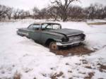 Chevy Impala  out in the snow
