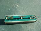 NOS 1964-66 Pontiac GTO Grille Name Plate